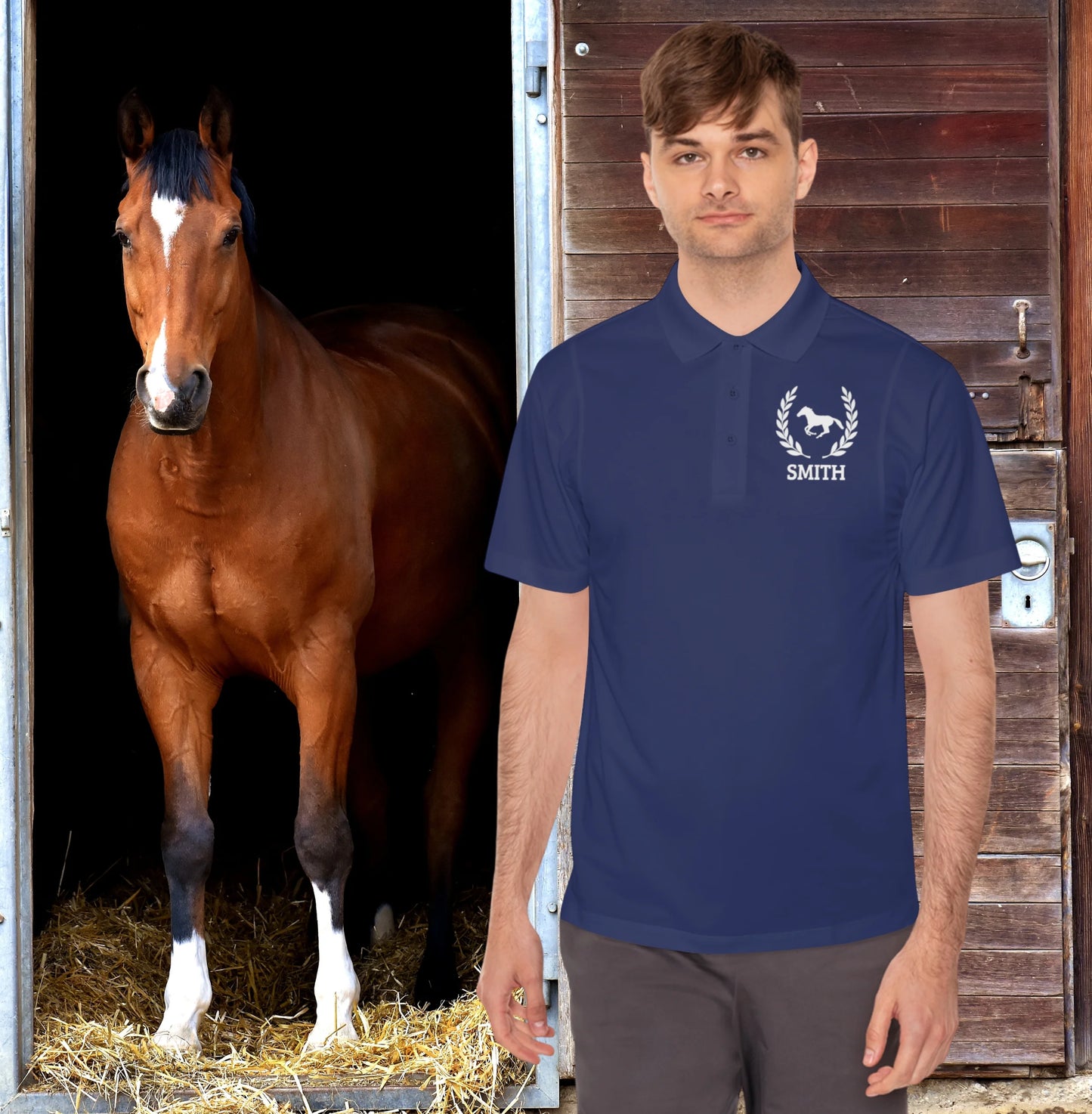 Equestrian polo shirt Man wearing a blue polo shirt with a horse logo and 'Smith' text, standing next to a brown horse in a stable.