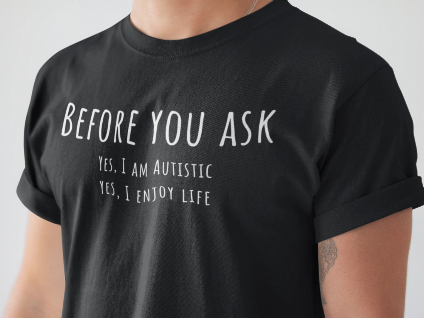 Black t-shirt with white text on a plain background