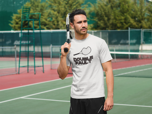 Double Fault Tee Man holding a tennis racket on a tennis court wearing a 'Double Fault' t-shirt.