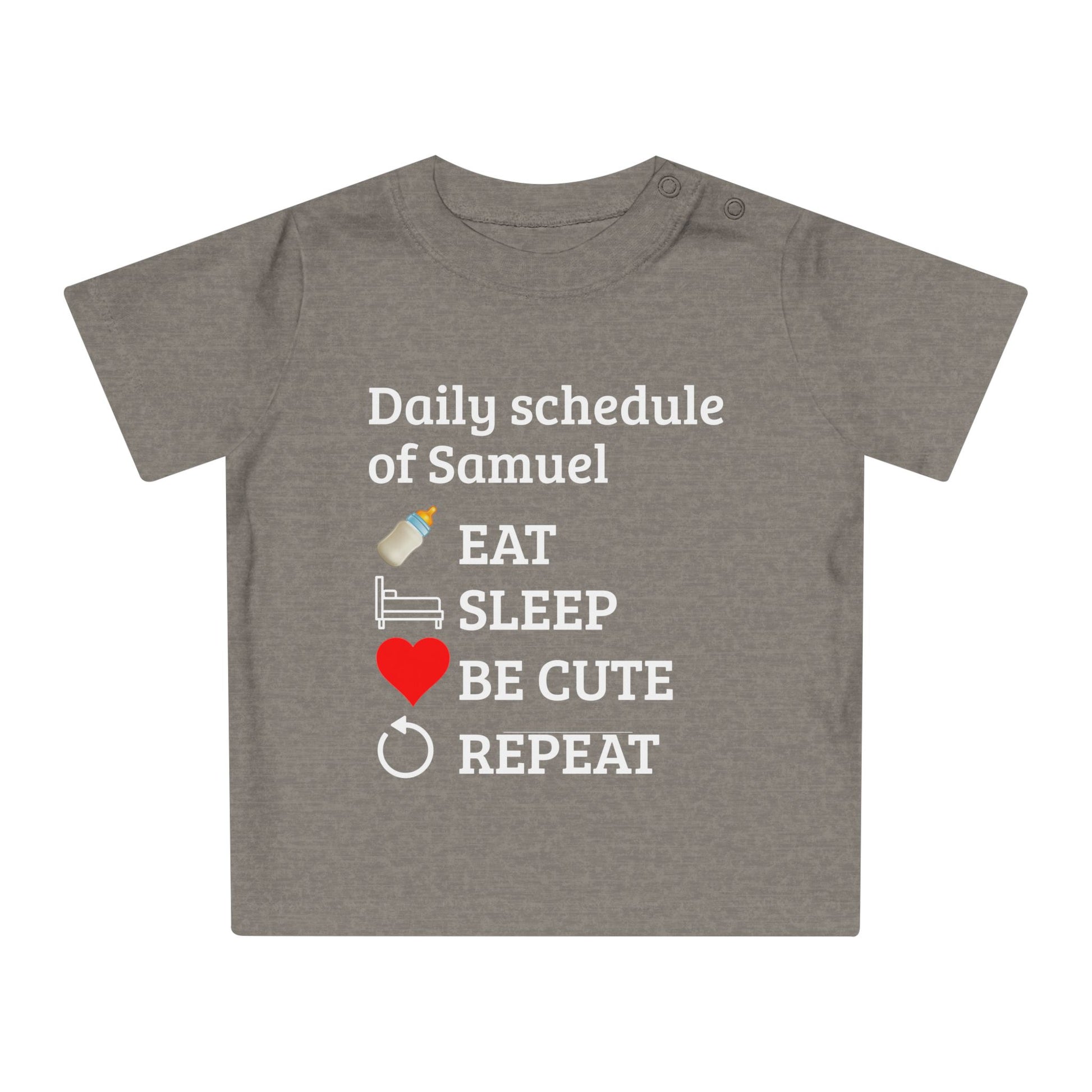 baby gift idea A heather gray short-sleeve baby t-shirt with a white text graphic reading 'Daily schedule of Samuel' followed by icons and words for EAT, SLEEP, BE CUTE, and REPEAT, shown on a plain white background.