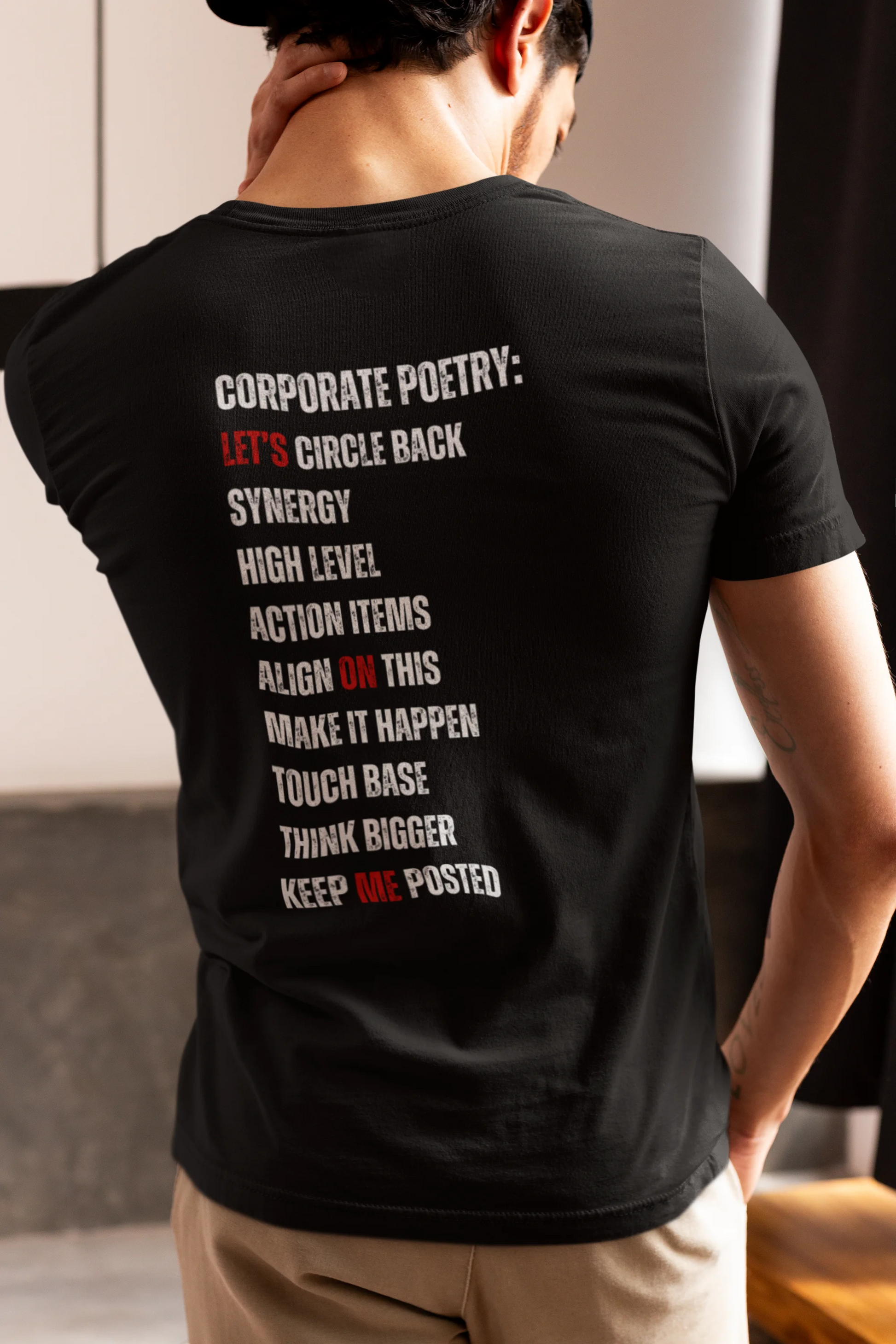 Gift for Boss Funny  Person wearing a black t-shirt with text on the back in an indoor setting