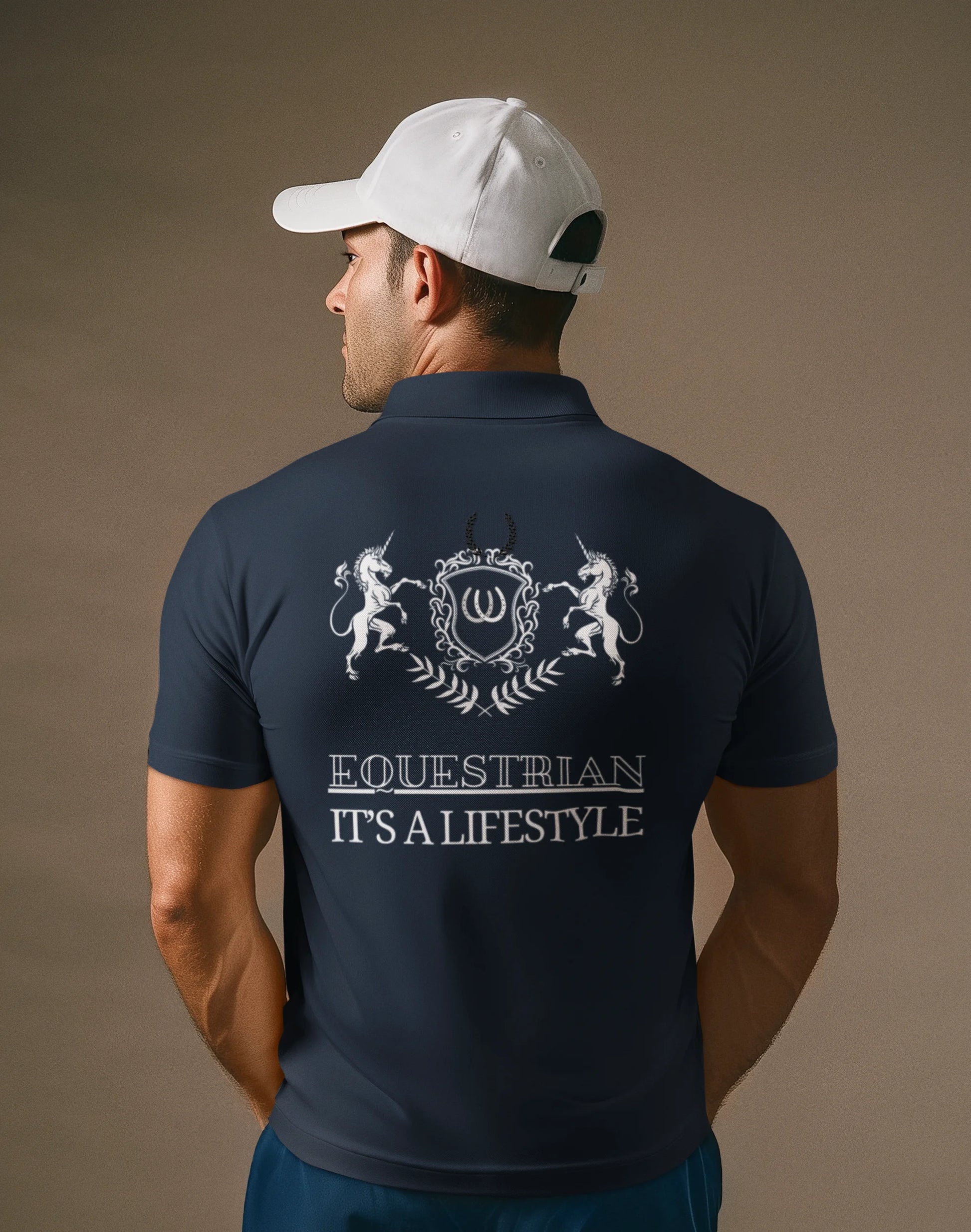 Man wearing a navy blue polo shirt with equestrian design and text on the back, against a brown background.