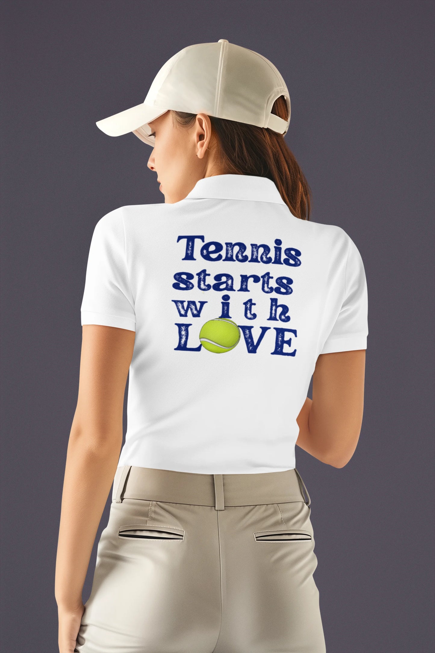 Tennis Polo Women Person wearing a white polo shirt with 'Tennis starts with LOVE' text and a tennis ball graphic.