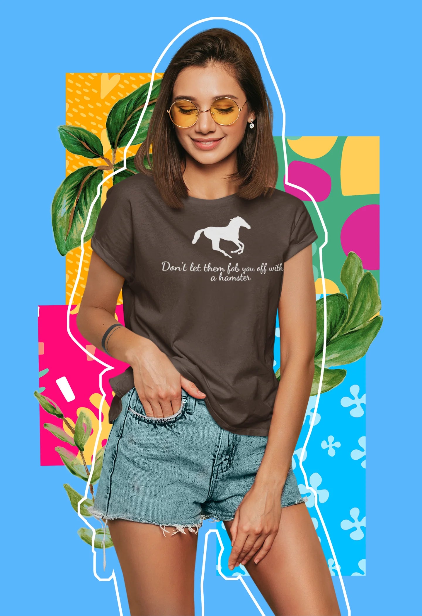 Equestrian Tee Woman wearing a brown t-shirt with a horse graphic and text, standing against a colorful abstract background.
