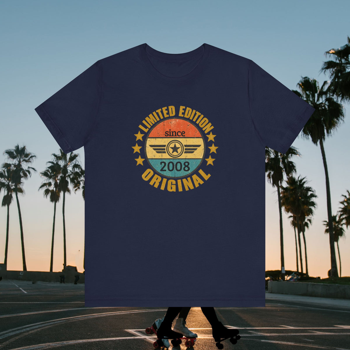custom year birthday t shirt A navy blue t-shirt with a retro circular graphic on the chest, featuring the text 'LIMITED EDITION since 2008 ORIGINAL' in yellow, orange, and teal. The shirt is displayed against a background of a sunset street scene with palm trees and roller skaters.