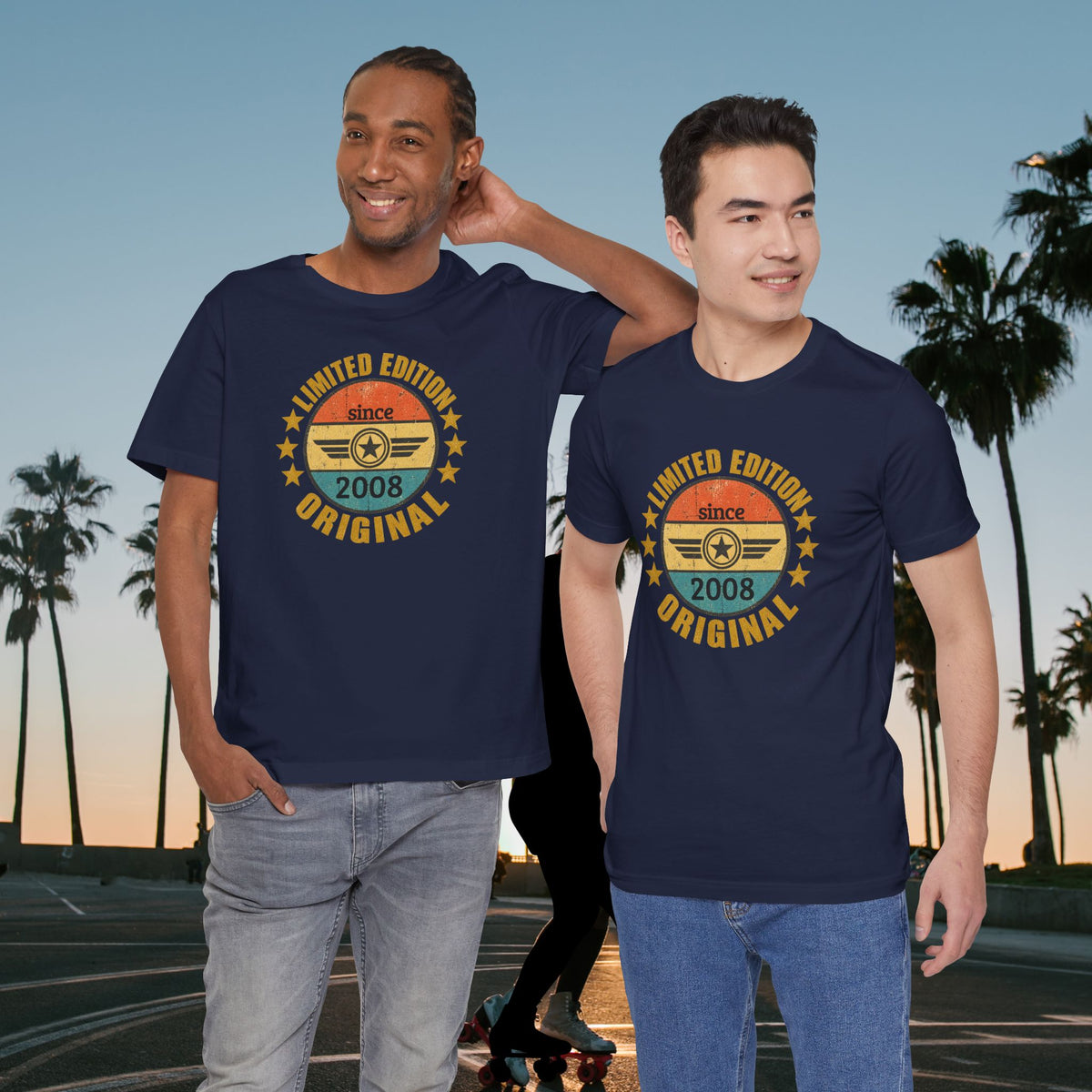 custom year birthday t shirt Two men wearing matching navy blue t-shirts with a retro 2008 graphic print, standing outdoors on a skatepark at sunset with palm trees in the background.