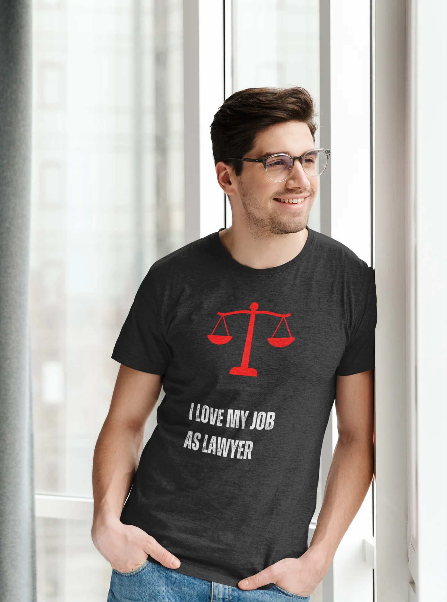 Funny Lawyer Shirt Man wearing a black t-shirt with a lawyer-themed design, standing indoors.