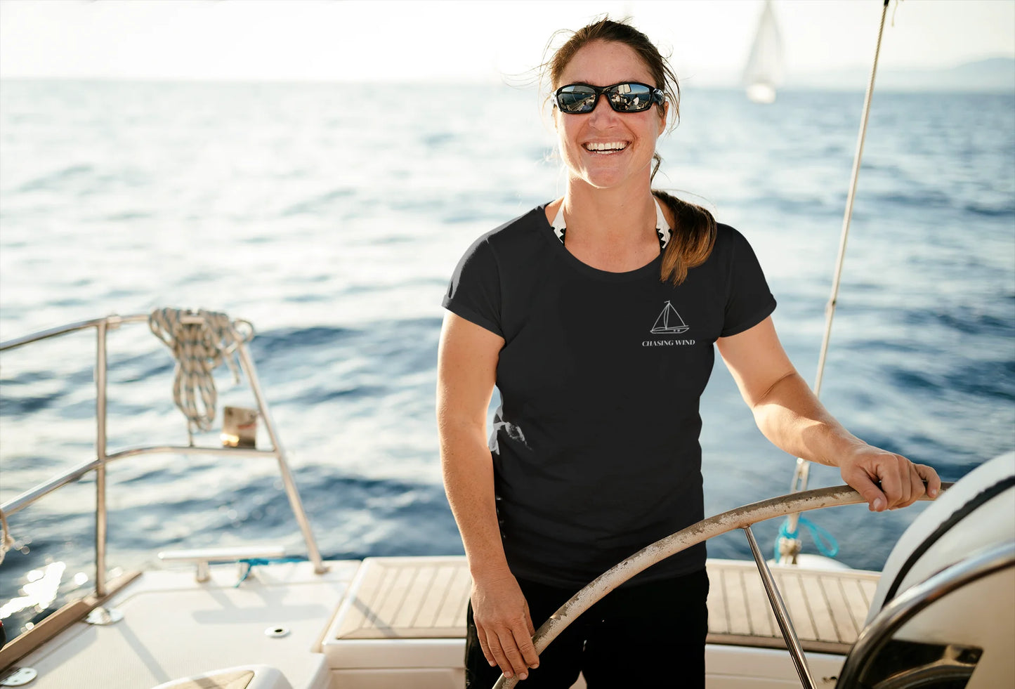 Sailing T-Shirt Woman on a sailboat in the ocean