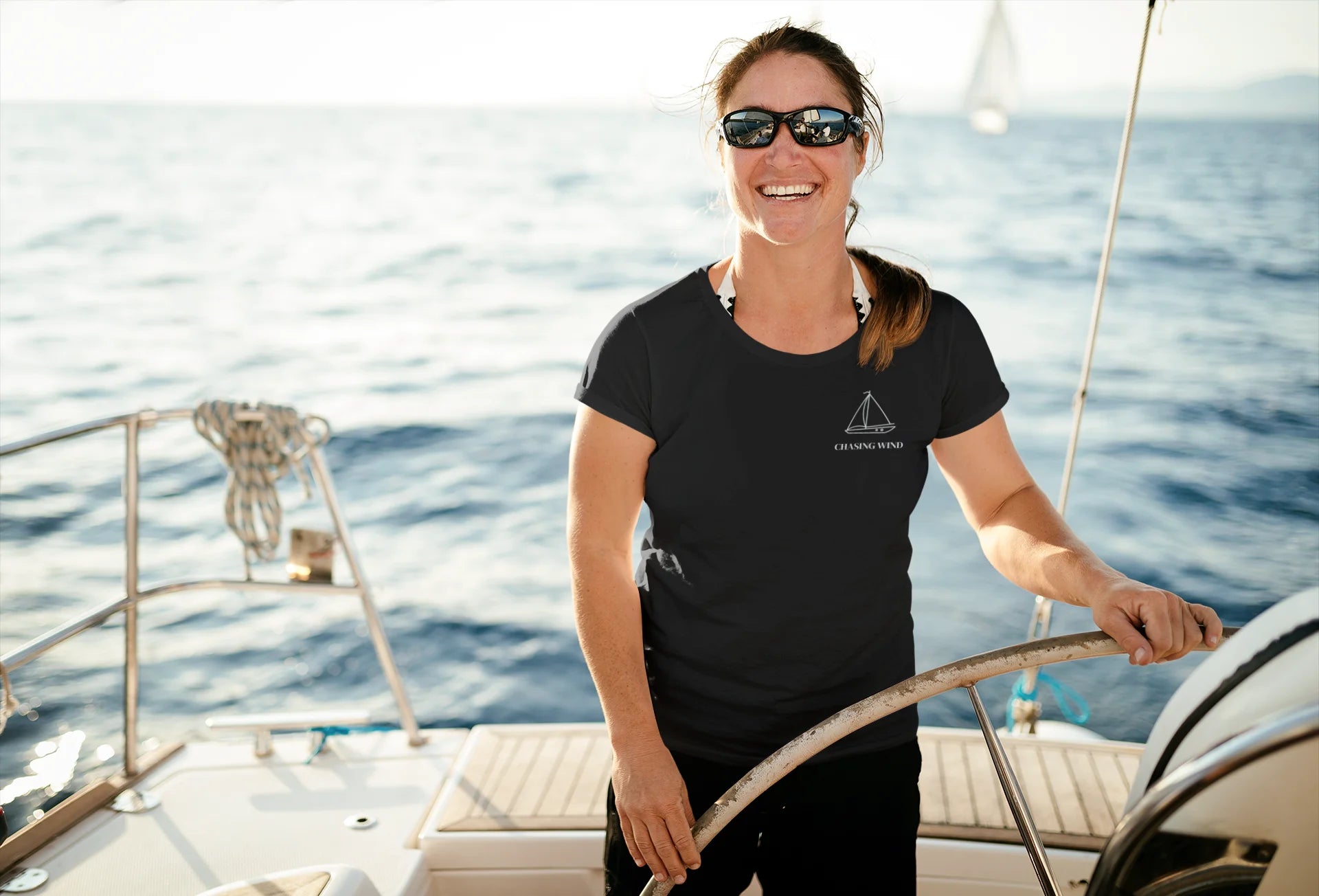 Sailing T-Shirt Woman on a sailboat in the ocean