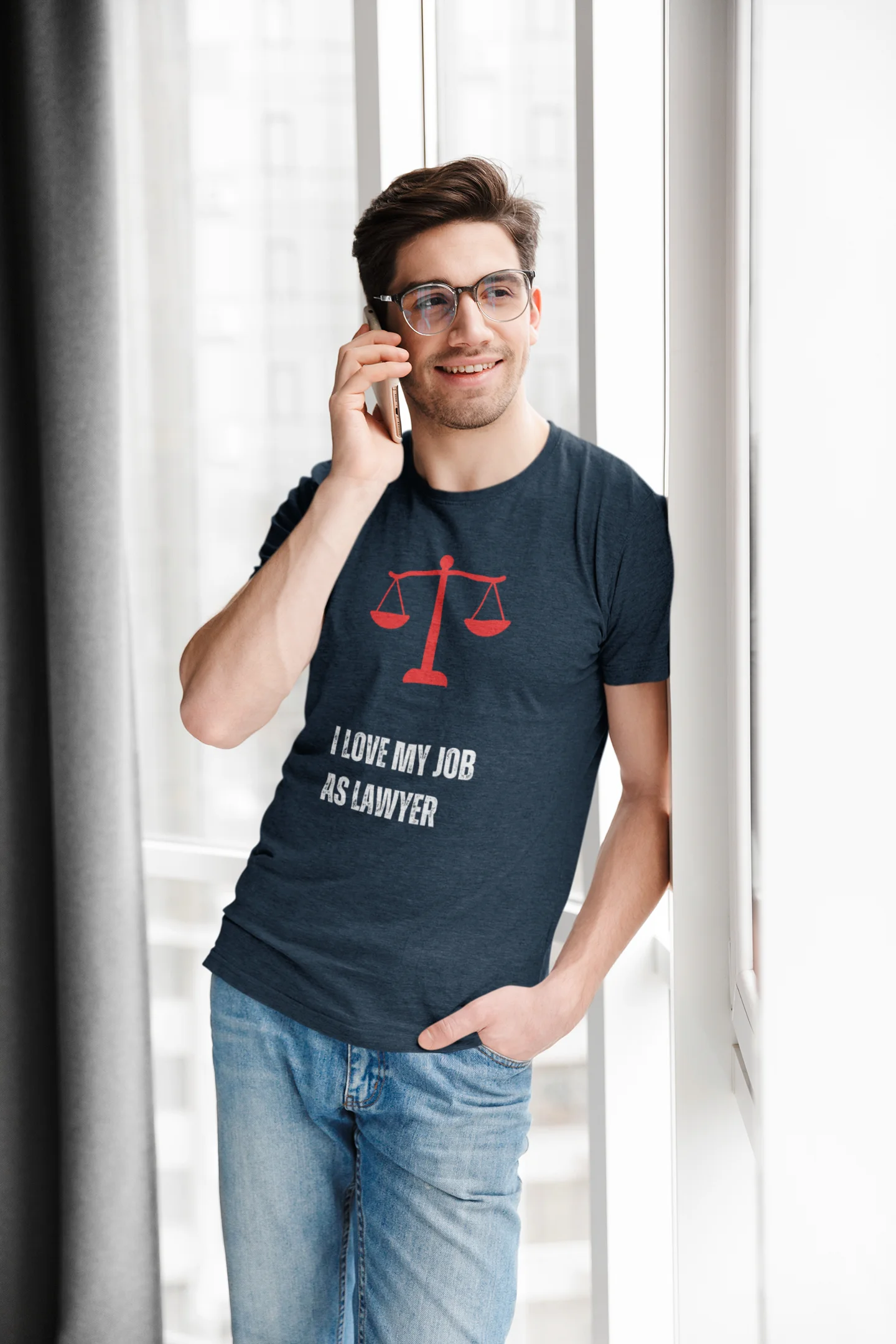 Funny Lawyer Shirt Man wearing a t-shirt with a lawyer design and text, standing indoors.