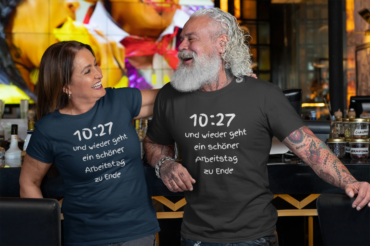 Lustiges T Shirt Two people wearing t-shirts with text, standing in a casual setting.