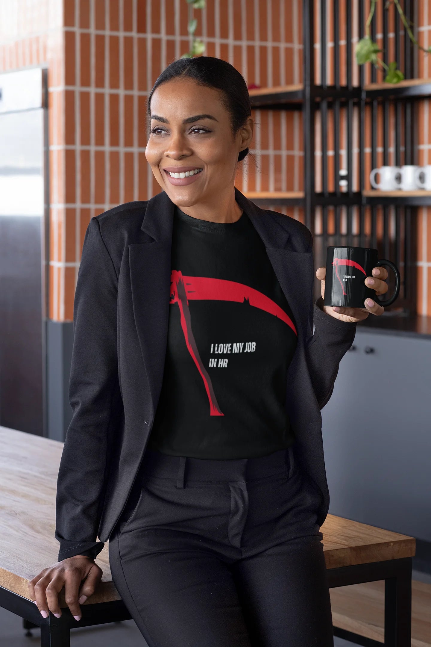 Woman holding a mug in a kitchen setting