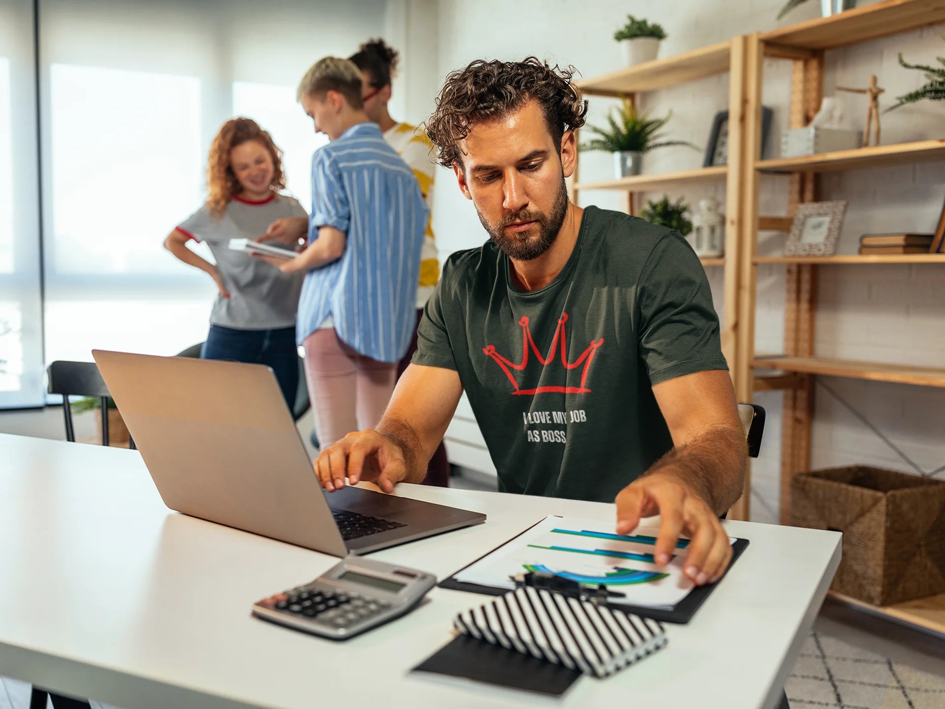 Gift for Boss Funny  Man using a laptop at a desk with people in the background