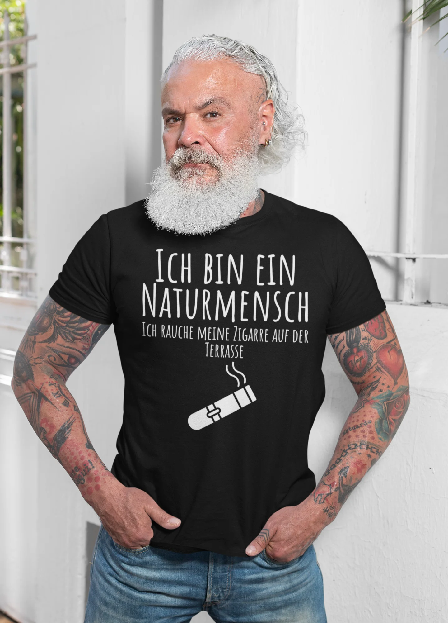 Man wearing a black t-shirt with German text and a cigarette graphic.