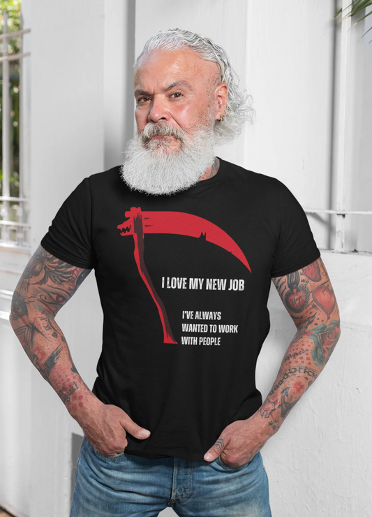 Man wearing a black t-shirt with a graphic and text, standing against a white background.