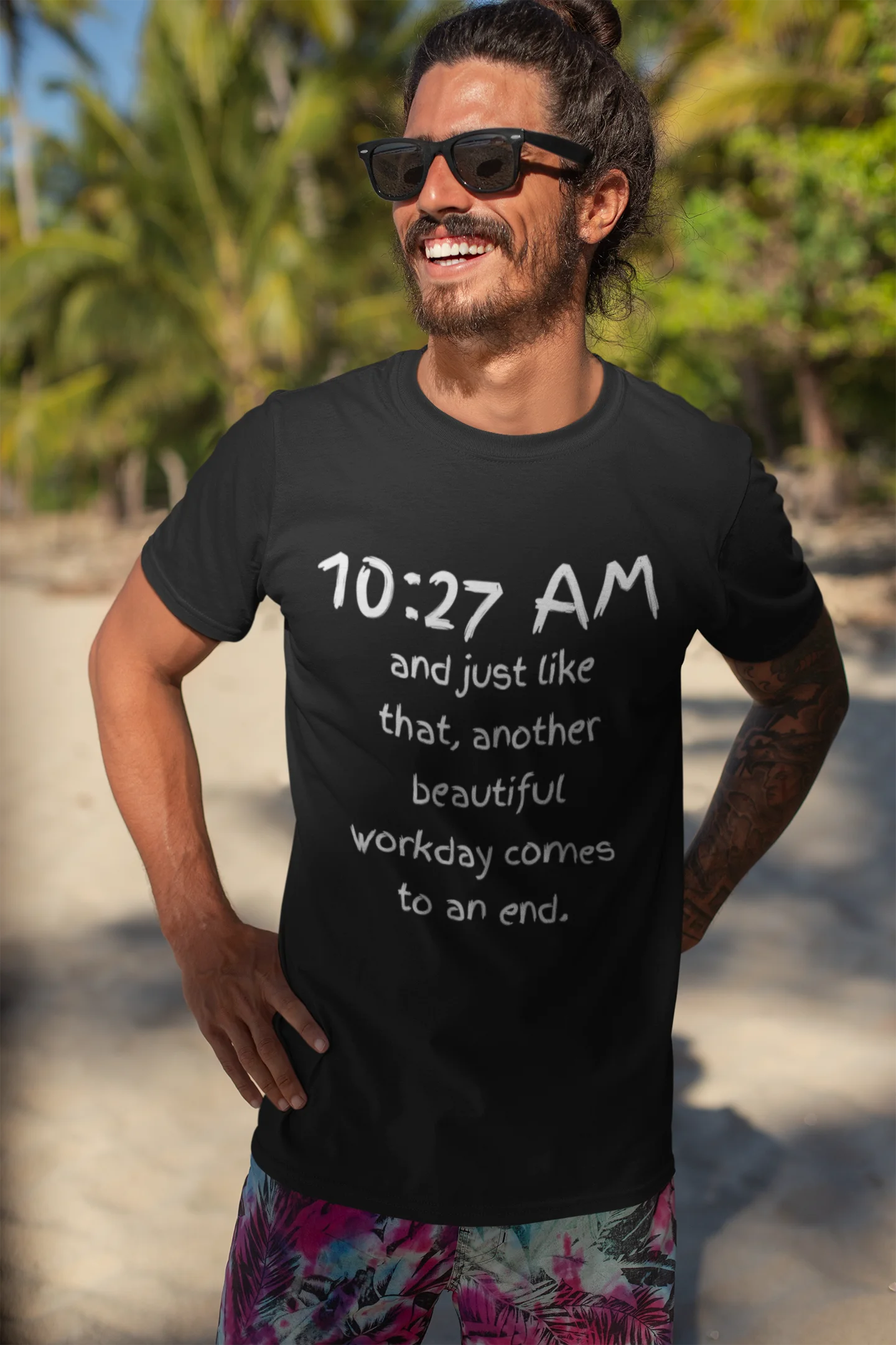 funny office shirt Man wearing a black t-shirt with text, standing outdoors with greenery in the background