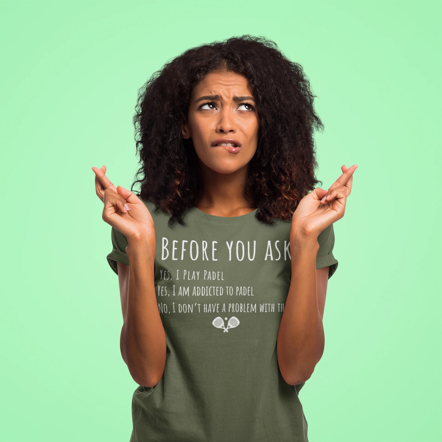 Woman wearing a green t-shirt with text on a light green background
