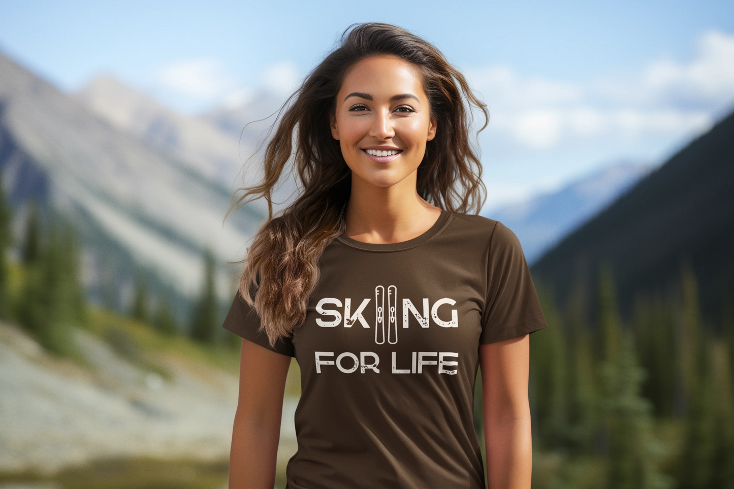 Woman wearing a 'Skiing for Life' t-shirt with a mountainous background