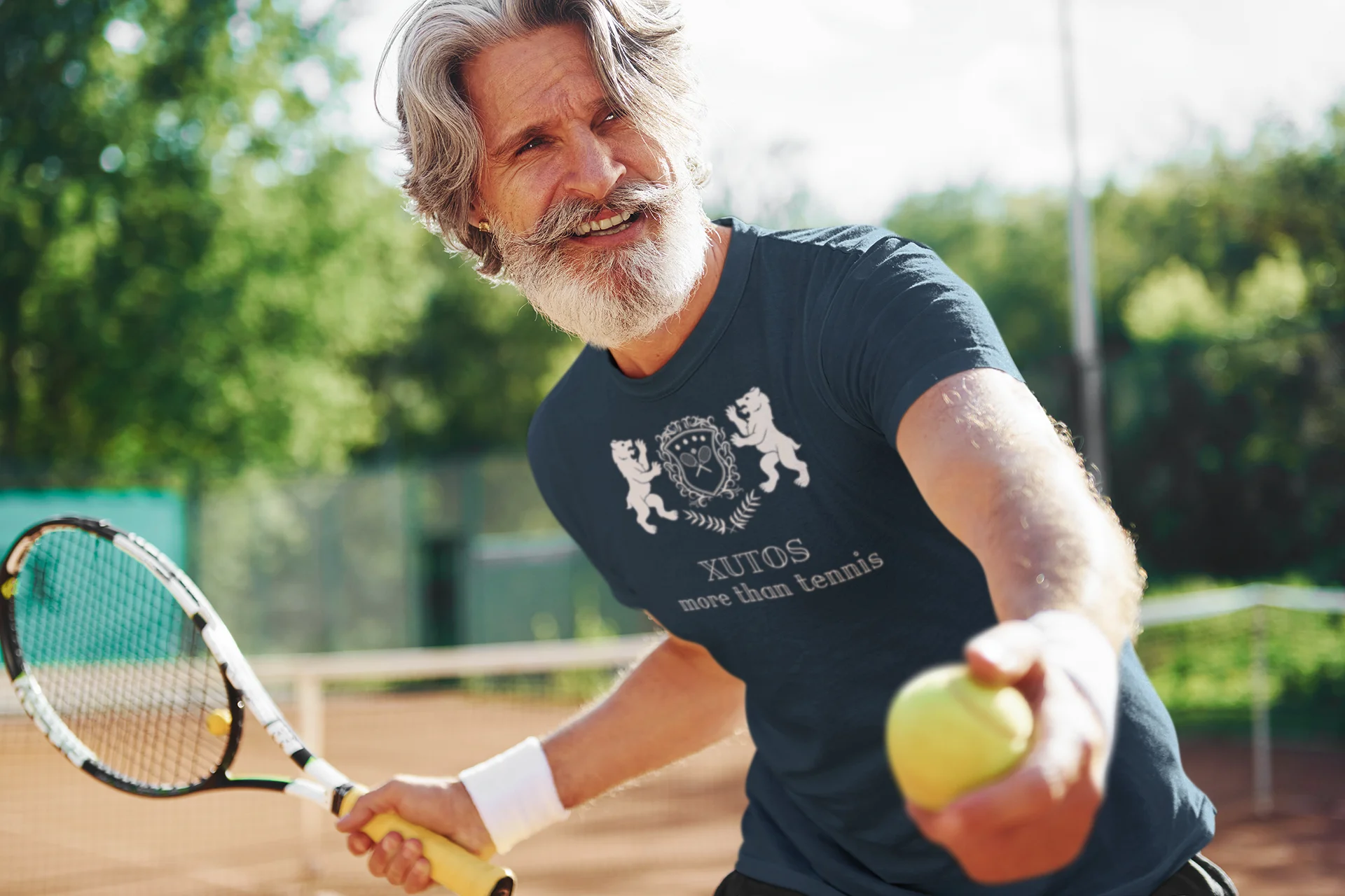 Xutos More than tennis Man playing tennis on a court with trees in the background