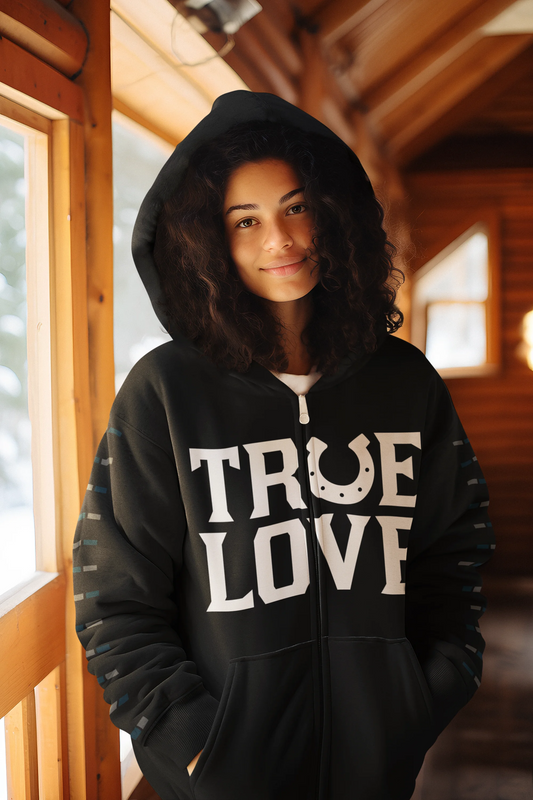 True love horseshoe hoodie Person wearing a black hoodie with 'TRUE LOVE' text indoors.